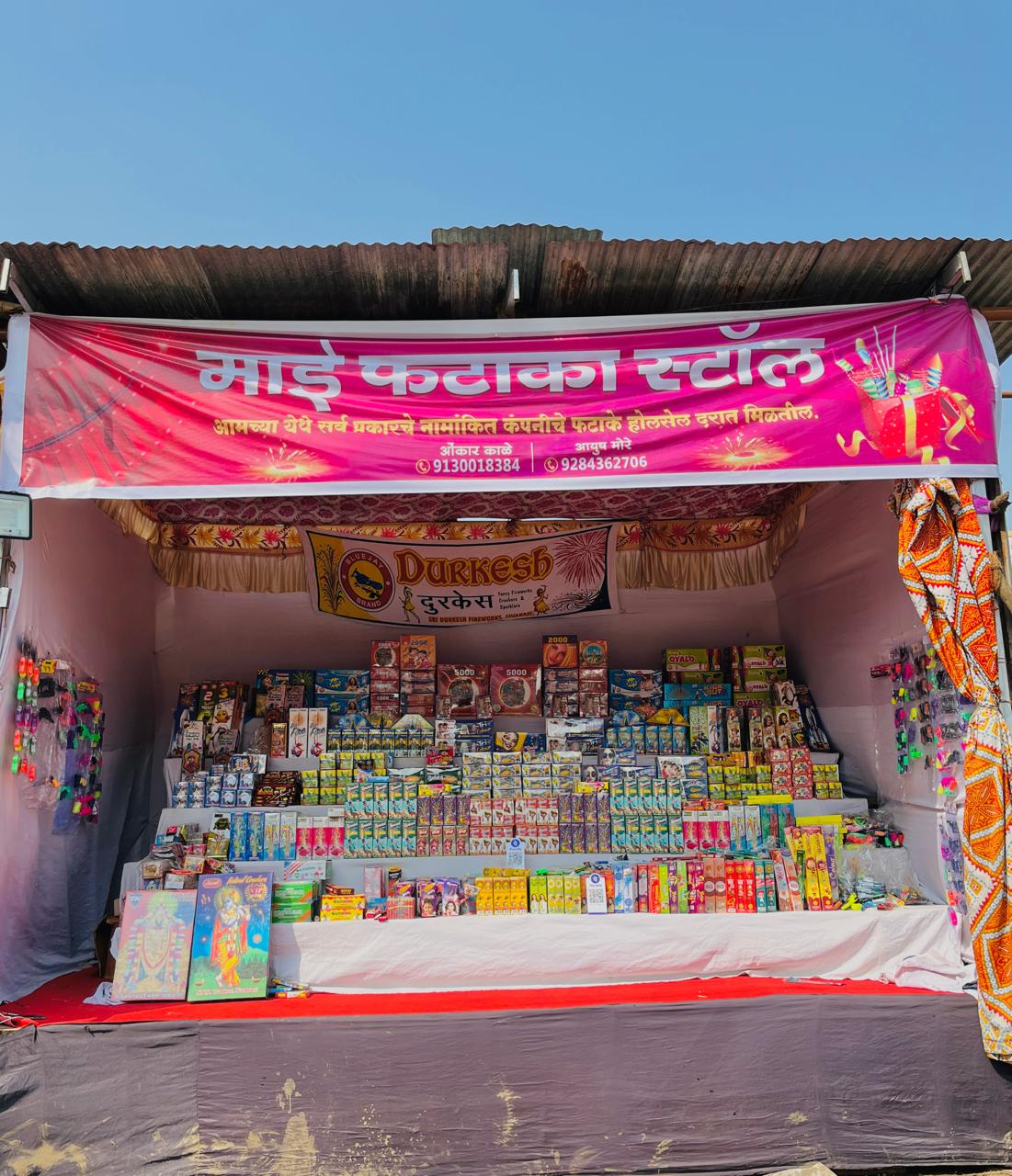 Wholesale fireworks assortment displayed in warehouse setting